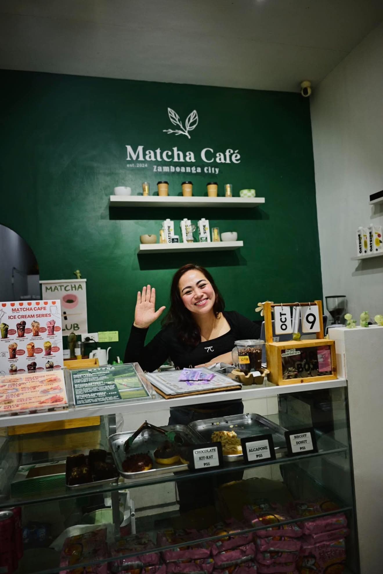 The Matcha Café owner waving behind the counter in Zamboanga City